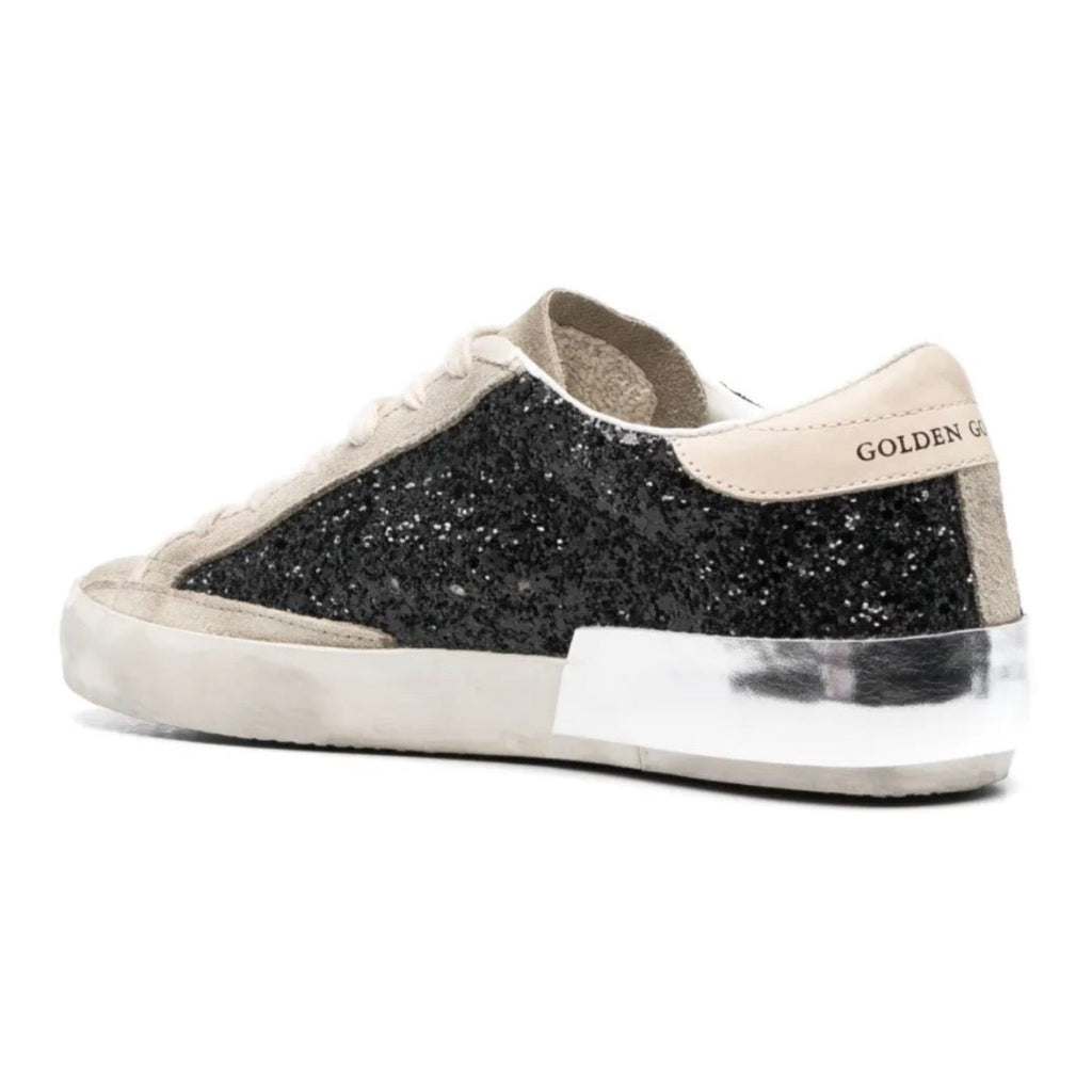 Golden Goose Super-Star trainers in black glitter with cream star and suede inserts