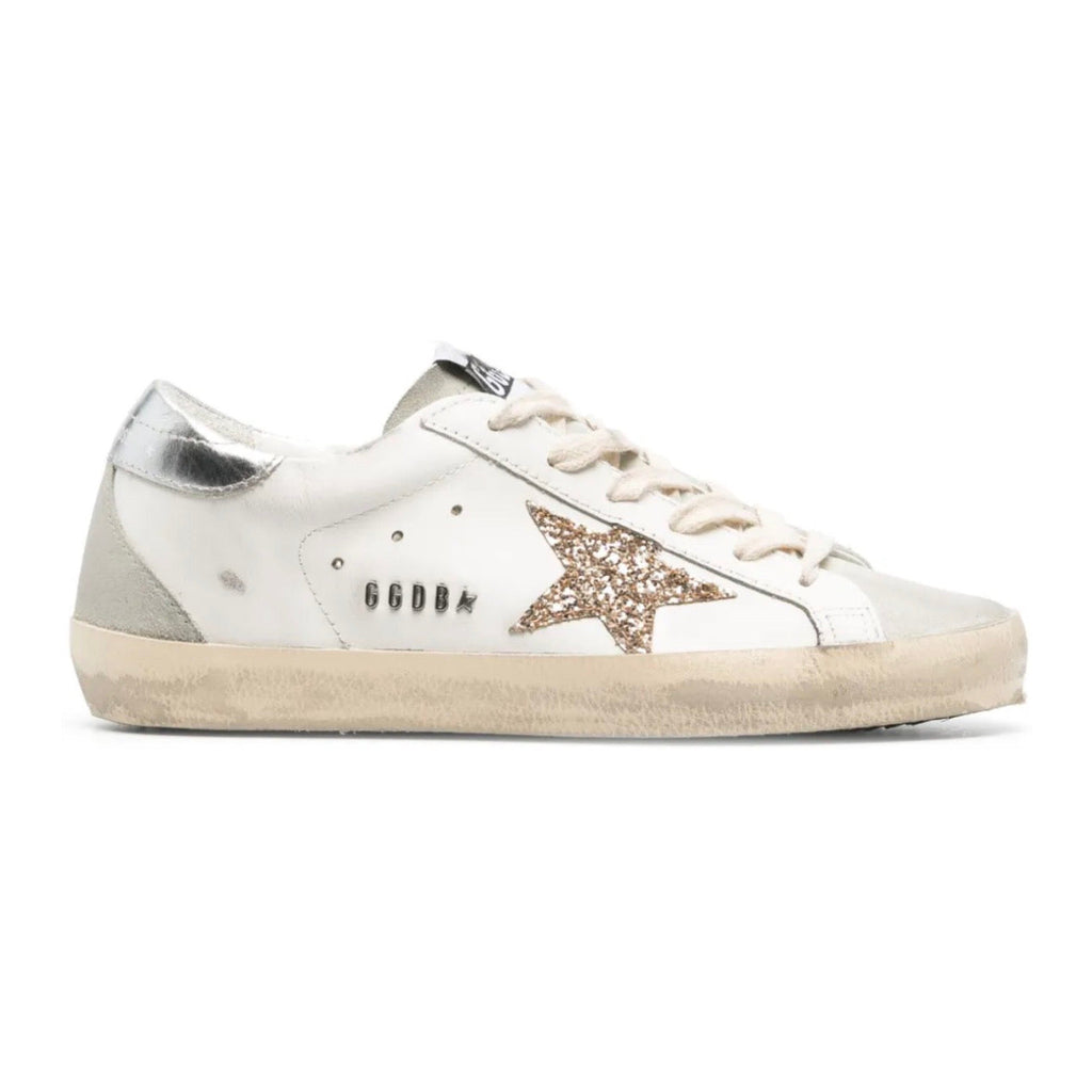 Golden Goose Super-Star trainers with gold glitter star and ice-gray suede inserts