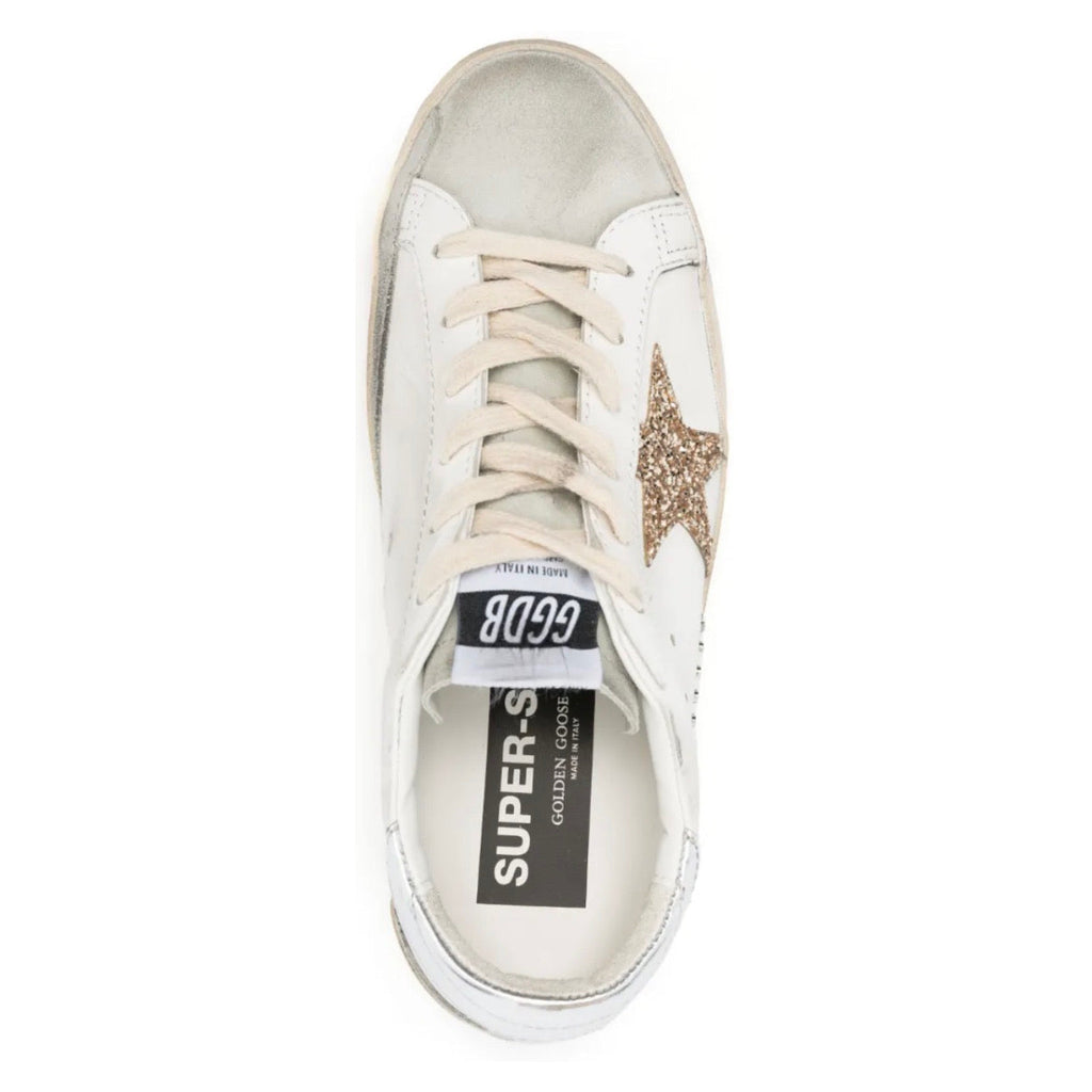 Golden Goose Super-Star trainers with gold glitter star and ice-gray suede inserts