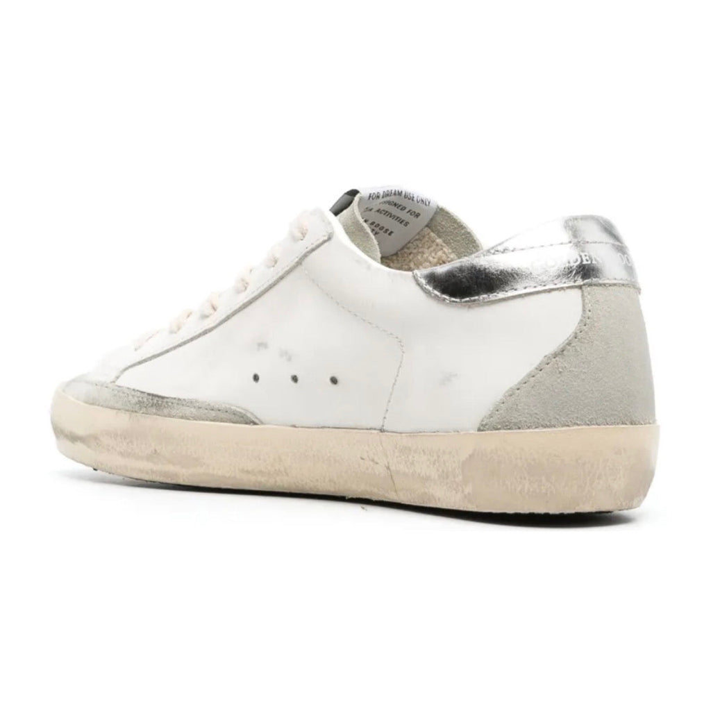 Golden Goose Super-Star trainers with gold glitter star and ice-gray suede inserts